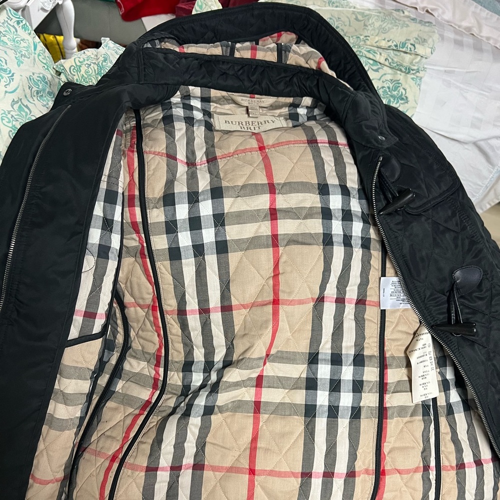 Authentic Burberry jacket worn twice. Excellent condition